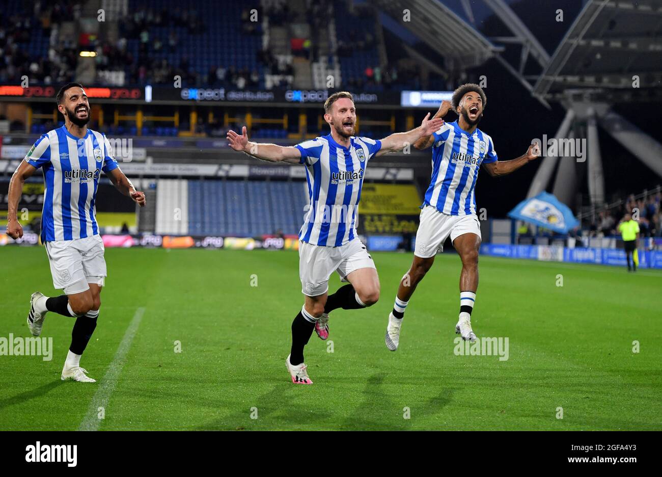 Huddersfield Town’s Tom Lees celebrates after scoring his sides first goal during the Carabao Cup second round match at John Smiths' Stadium, Huddersfield. Picture date: Tuesday August 24, 2021. Stock Photo