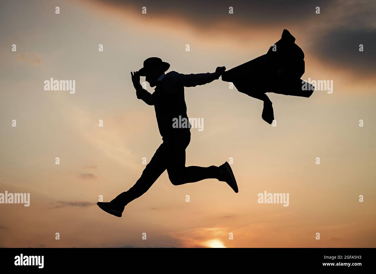 Chained To The Sky Personal Achievement Goal Man Silhouette Jump On Sky Background Confident Businessman Running Daily Motivation Enjoying Life Stock Photo Alamy Chained To The Sky Personal Achievement Goal Man Silhouette Jump On Sky Background Confident Businessman Running Daily Motivation Enjoying Life Stock Photo Alamy