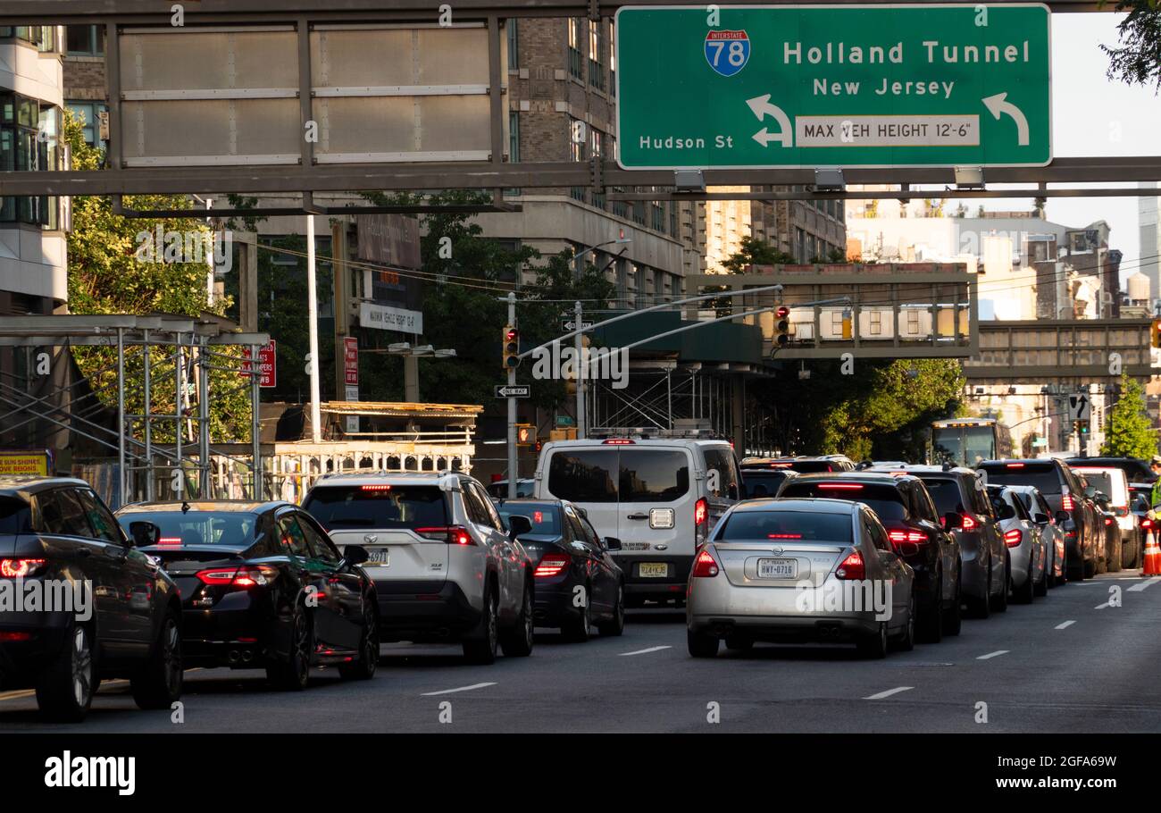Holland tunnel sign to New Jersey traffic jam in Manhattan NYC Stock