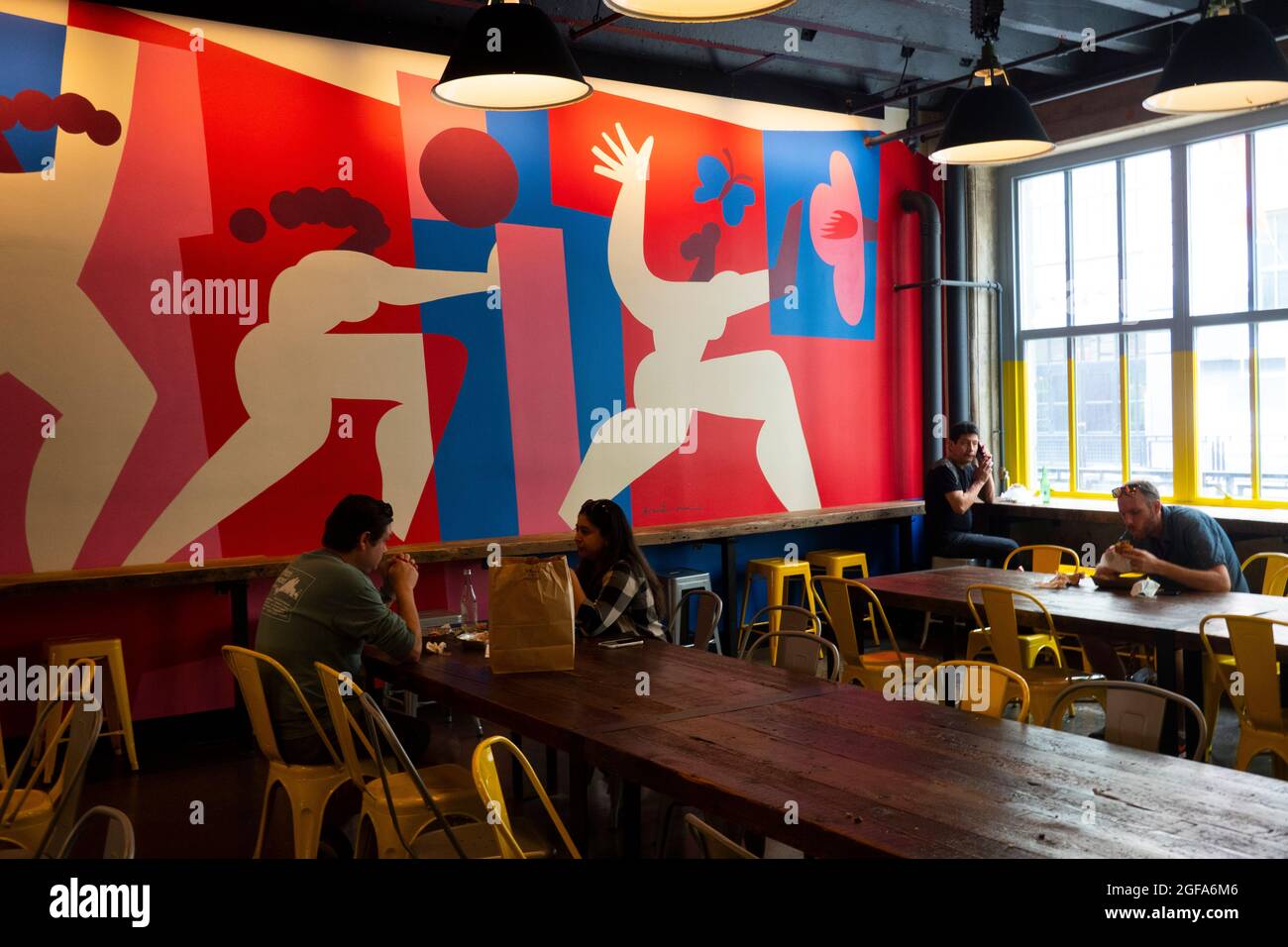 dining room in food court at industry city sunset park Brooklyn NYC Stock Photo