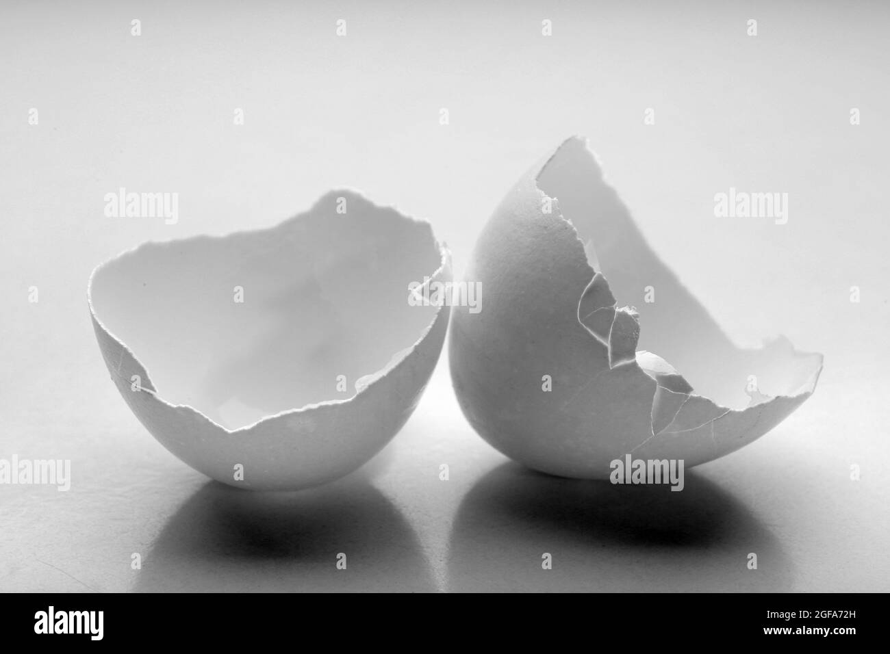 Cracked egg shell isolated on white Stock Photo Alamy