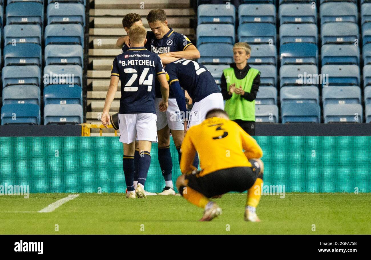 London, UK. 24th Aug, 2021. Matt Smith of Millwall celebrates after scoring their side's 3rd goal to make it 3-1 during the Carabao Cup match between Millwall and Cambridge United at The Den, London, England on 24 August 2021. Photo by Alan Stanford/PRiME Media Images. Credit: PRiME Media Images/Alamy Live News Stock Photo