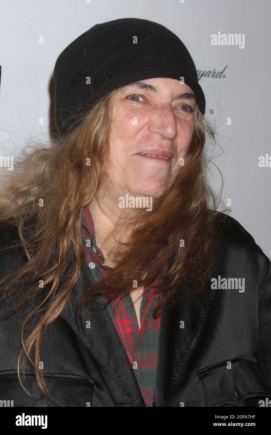 Patti Smith arriving at the opening night performance of 'Waiting For Godot' at the Cort Theatre in New York City on November 24, 2013.  Photo Credit: Henry McGee/MediaPunch Stock Photo