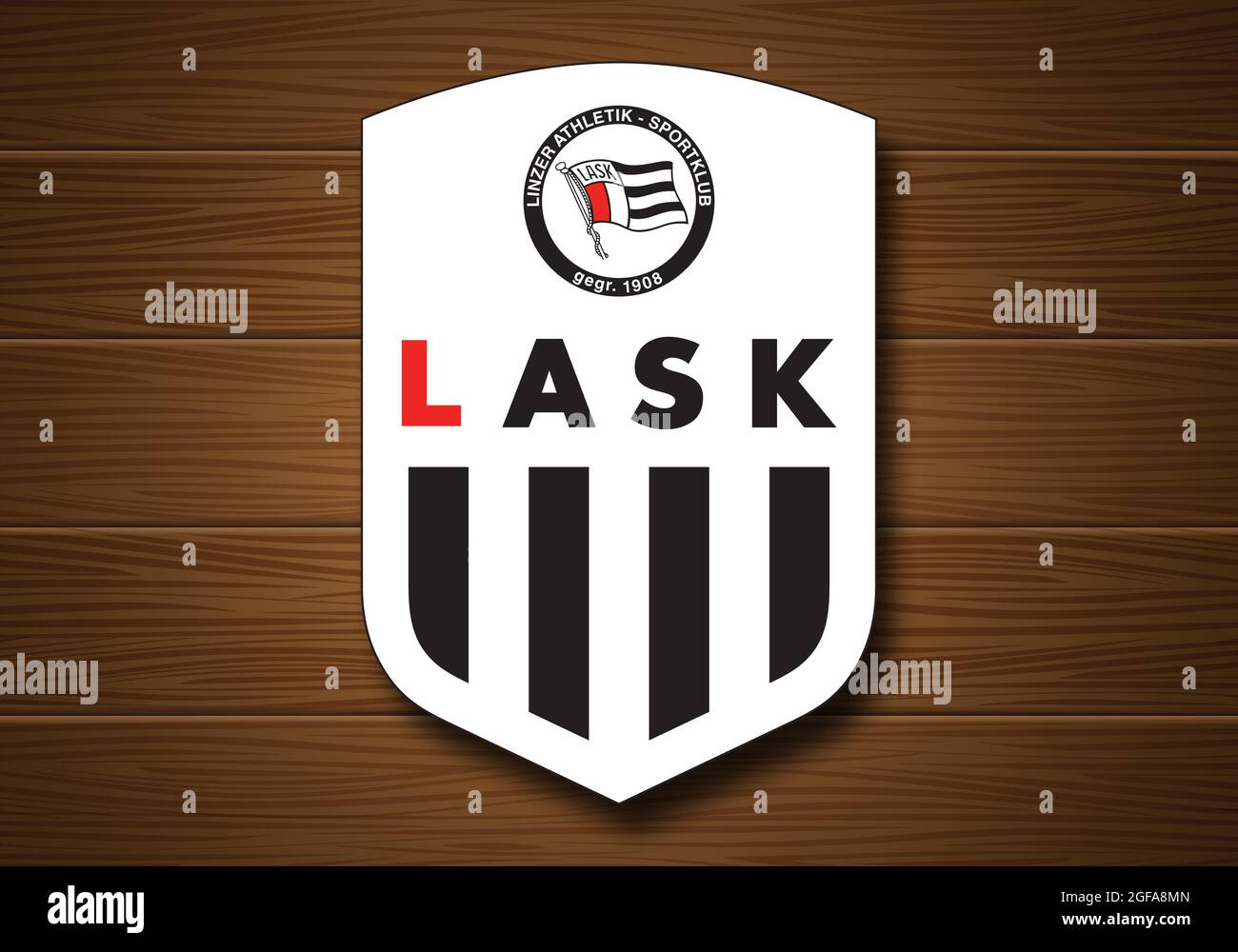 Coat of arms FC Lask, Linz, football club from Austria, wooden background Stock Photo