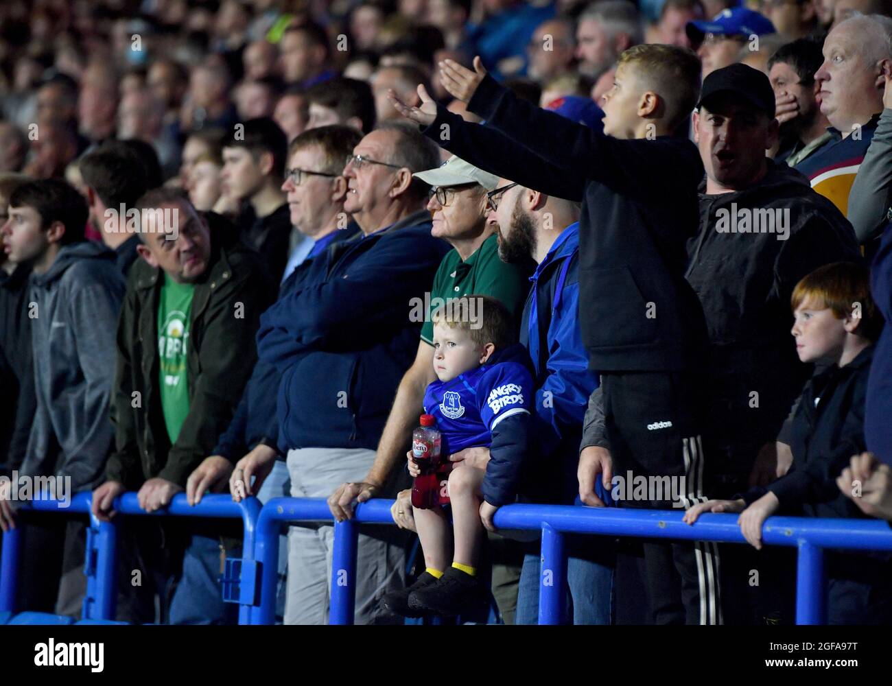 Everton fans watch the play during the Carabao Cup second round match at John Smiths' Stadium, Huddersfield. Picture date: Tuesday August 24, 2021. Stock Photo