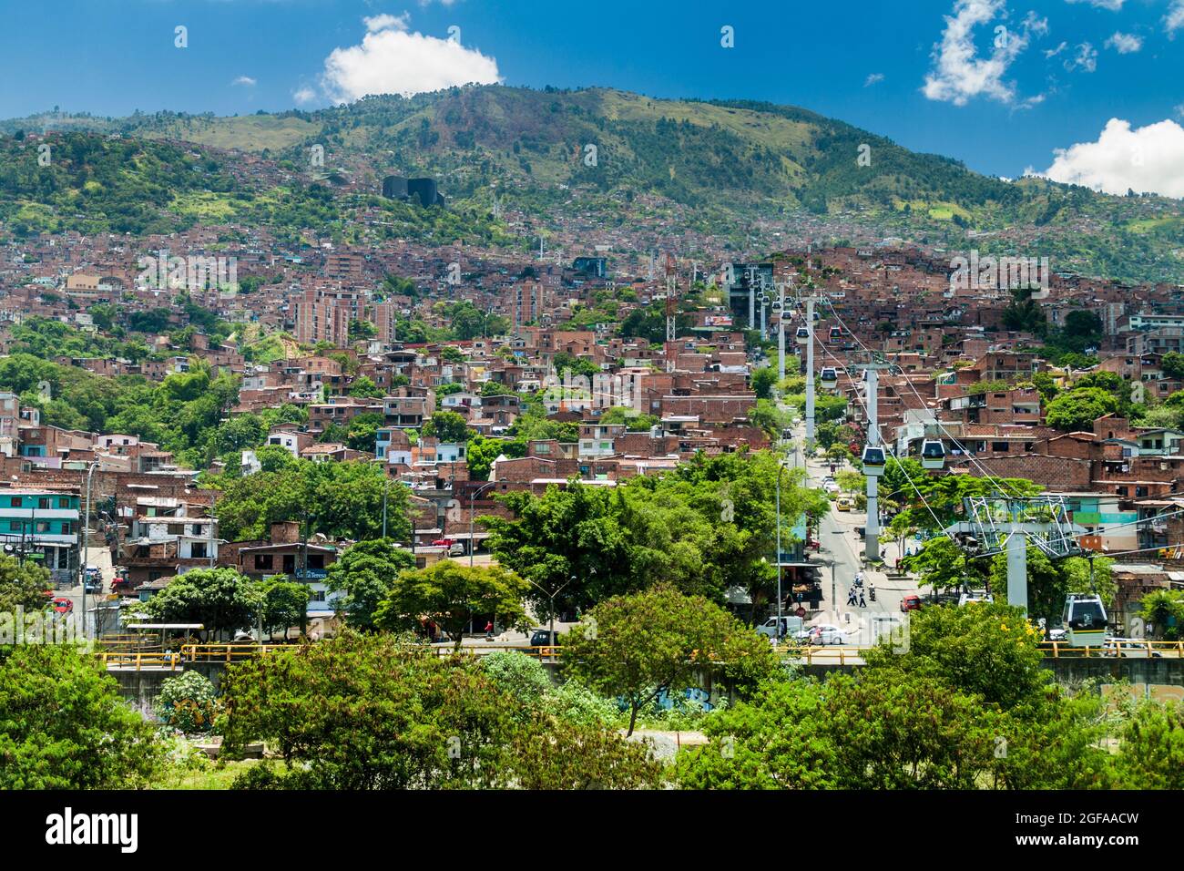 MEDELLIN, COLOMBIA - SEPTEMBER 4: Medellin cable car system connects poor neighborhoods in the hills around the city. Stock Photo