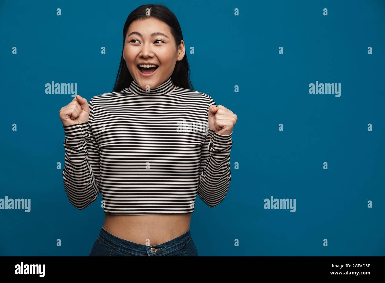 Excited asian teen girl hi-res stock photography and images - Alamy