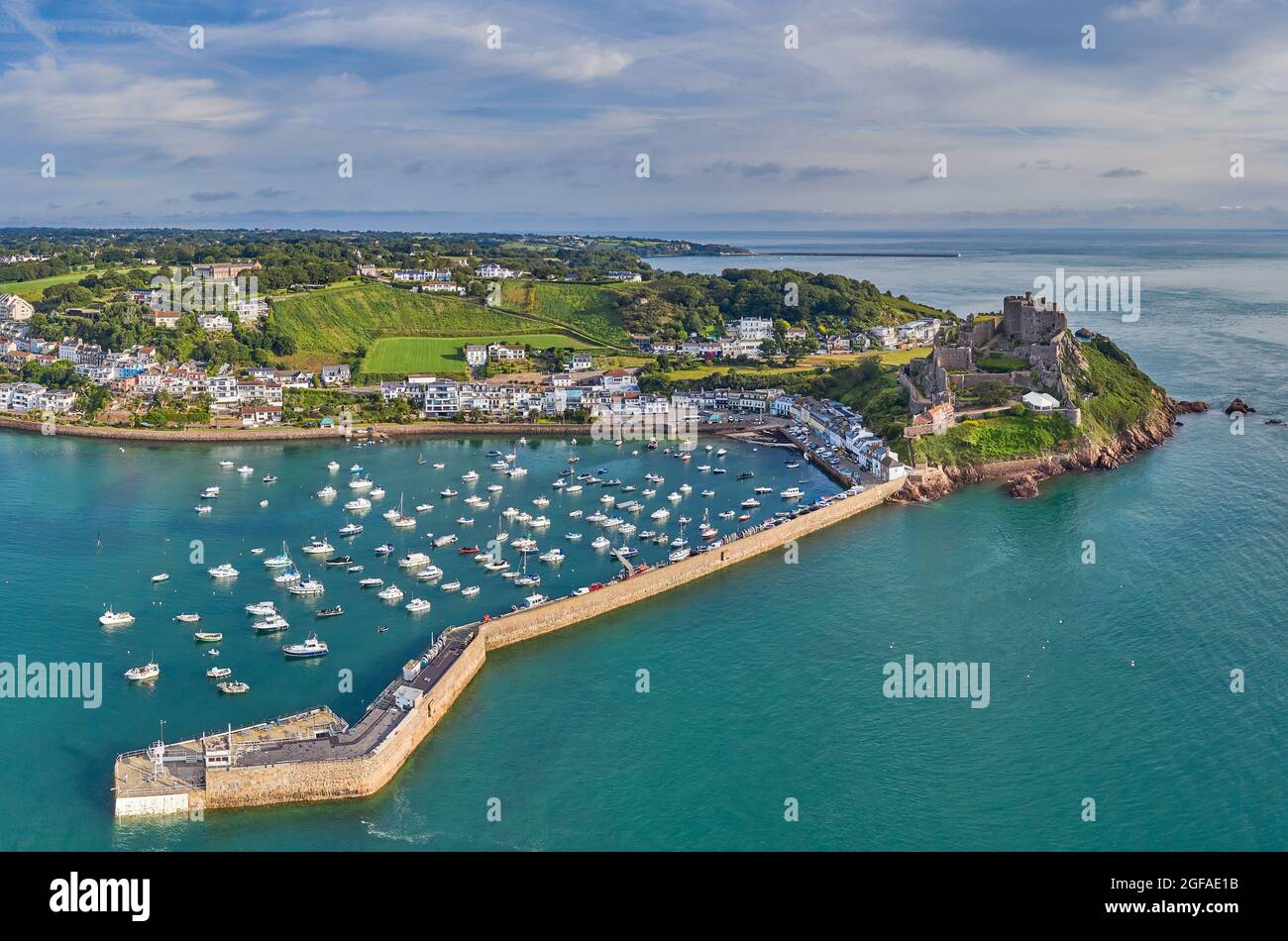 Drone aerial view of Gorey Harbour at high tide. Jersey, Channel Islands Stock Photo