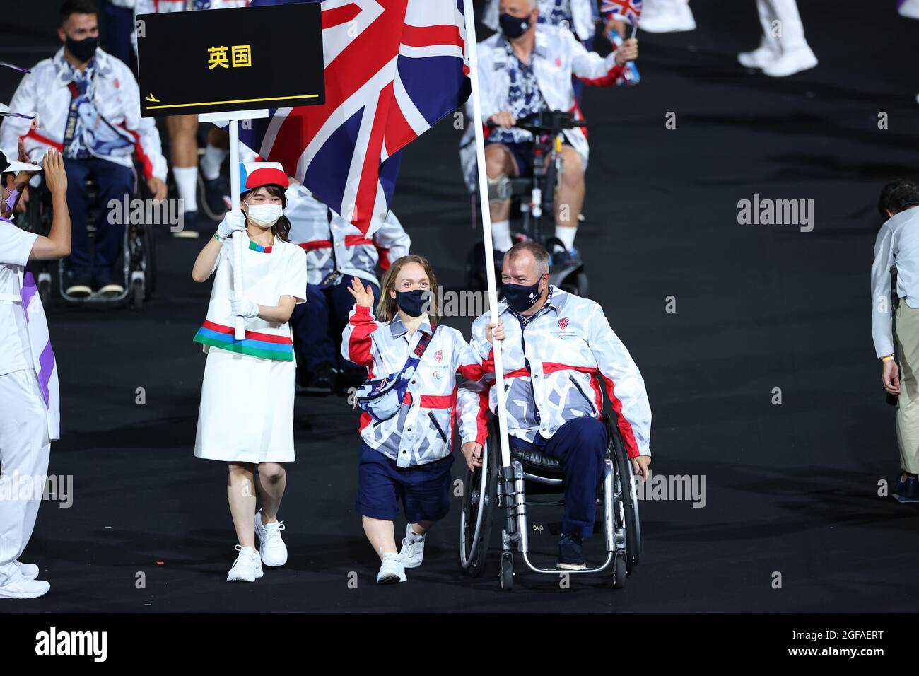 Swimmer Ellie Simmonds and archer John Stubbs carry the flag for the ...