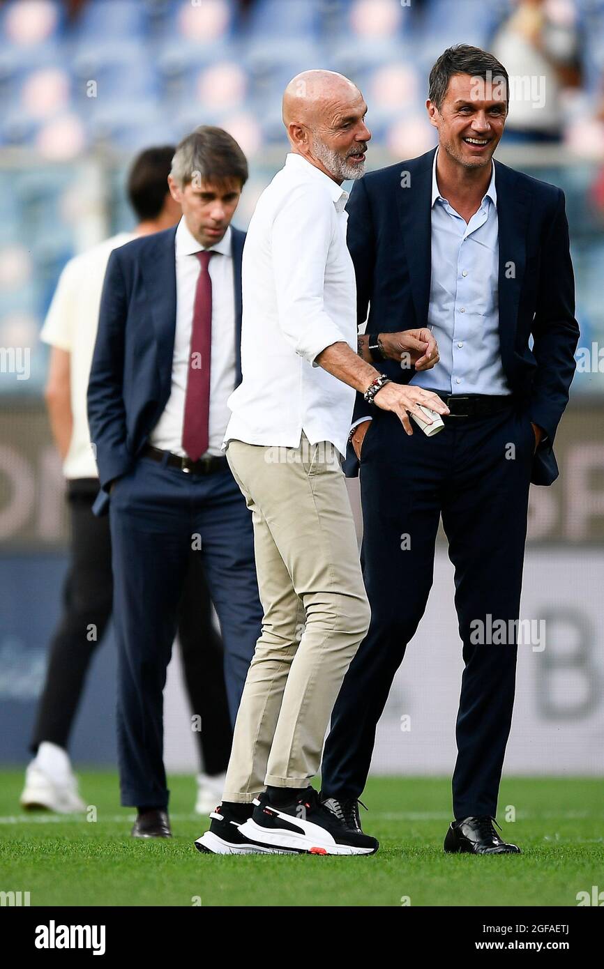 Genoa, Italy. 23 August 2021. Stefano Pioli, head coach of AC Milan, and Paolo  Maldini, technical area director of AC Milan, smiles prior to the Serie A  football match between UC Sampdoria