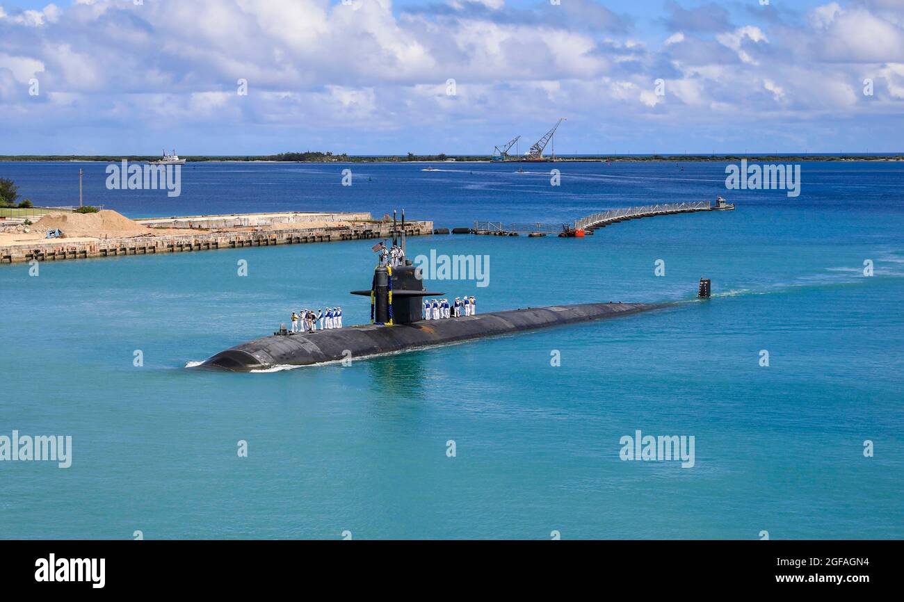 The U.S. Navy nuclear-power Los Angeles-class submarine USS Oklahoma City, returns to Naval Base Guam for the final time August 20, 2021 in Apra Harbor, Guam. The USS Oklahoma City is at the end of her life cycle and slated for decommissioning. Stock Photo