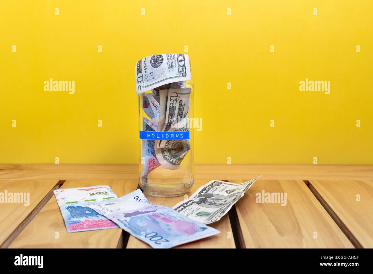 Dollar savings money jar banknote hi-res stock photography and images ...