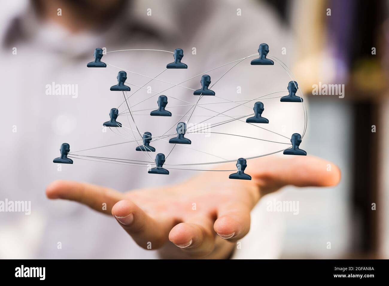 Male's hand holding an illustration of organization chart team concept ...