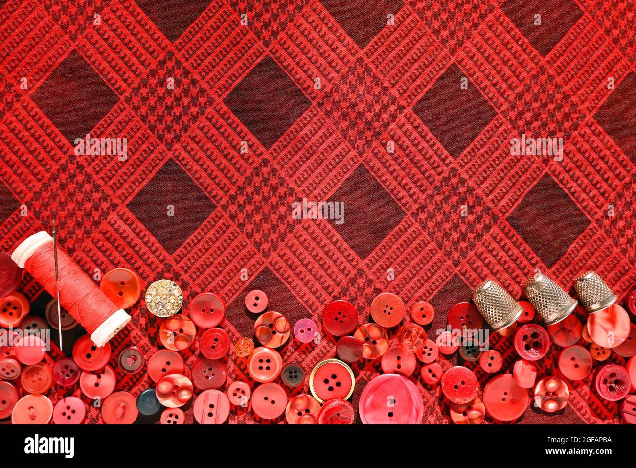 Red buttons, thimble, thread and needle for sewing. Seamstress Set ...