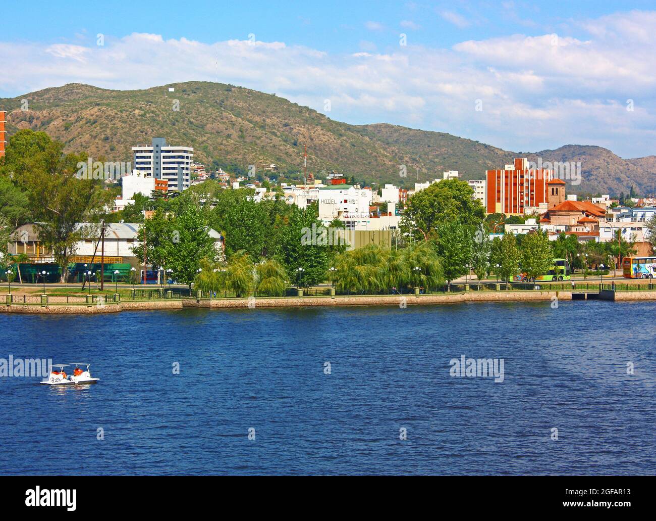 VILLA CARLOS PAZ, CORDOBA, ARGENTINA The Town in a sunny day. The San Roque lake in foreground and the hills at the background. Stock Photo