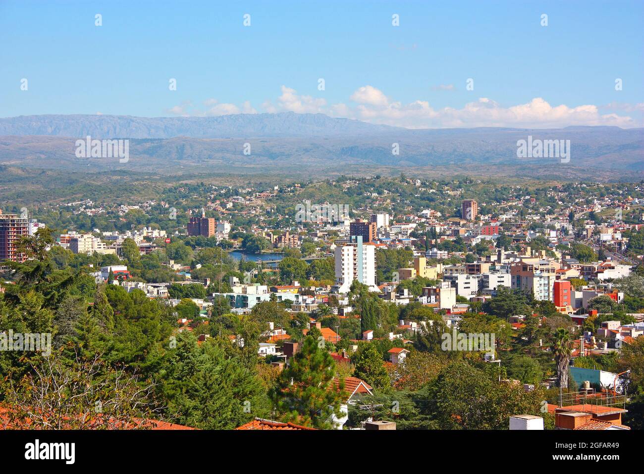 VILLA CARLOS PAZ, CORDOBA, ARGENTINA.Panoramic view from the top of a hill of the landscape of Carlos Paz Town in a sunny day. Stock Photo