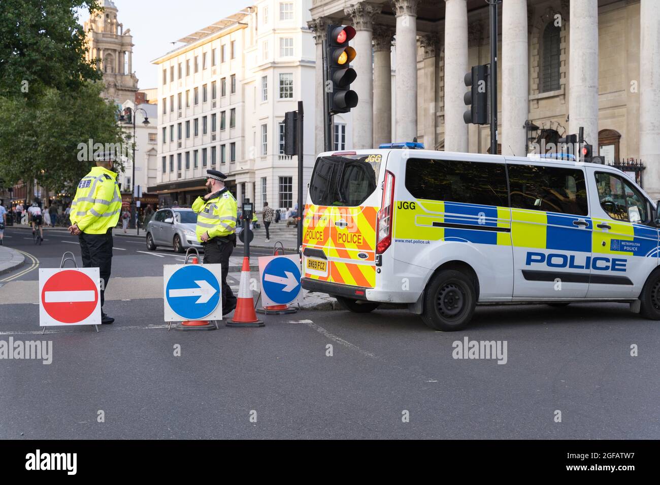 Cambridge Circus, London, UK. 24th August 2021. Climate change protesters from Extinction Rebellion protesting at Cambridge Circus , blocking Charing Cross road along the way to Trafalgar Square. Credit: Xiu Bao/Alamy Live News Stock Photo