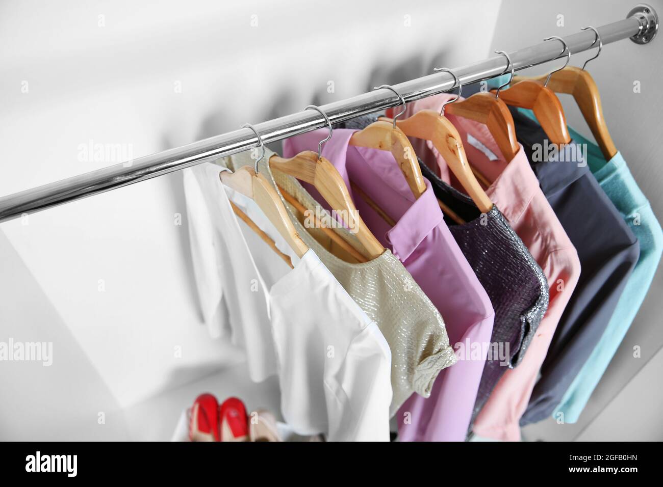 Female clothes hanging in wardrobe Stock Photo Alamy