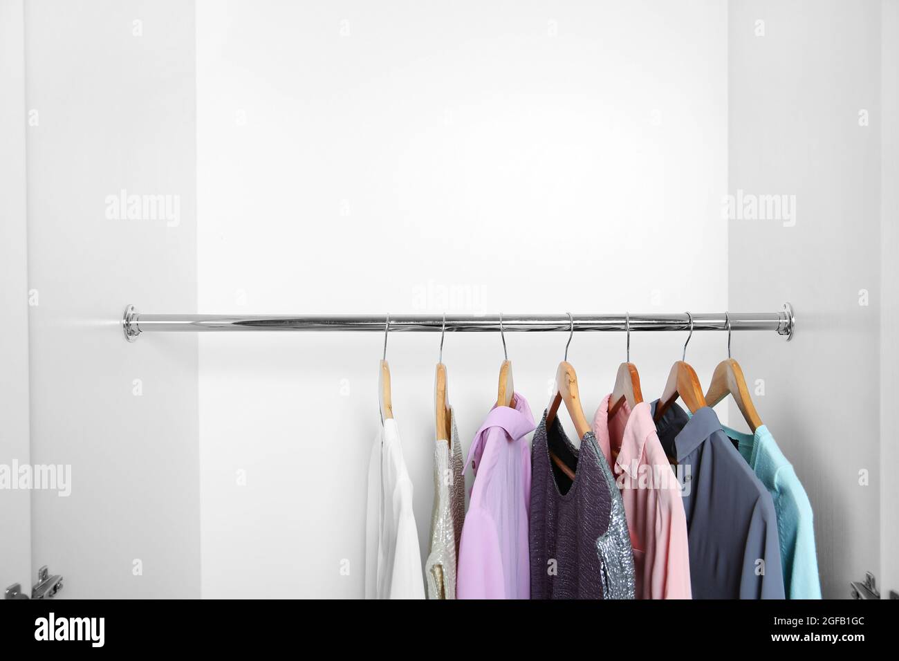 Female clothes hanging in wardrobe Stock Photo Alamy
