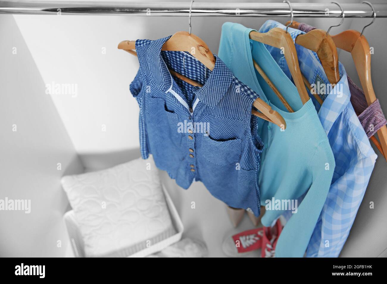 Female clothes hanging in wardrobe Stock Photo Alamy