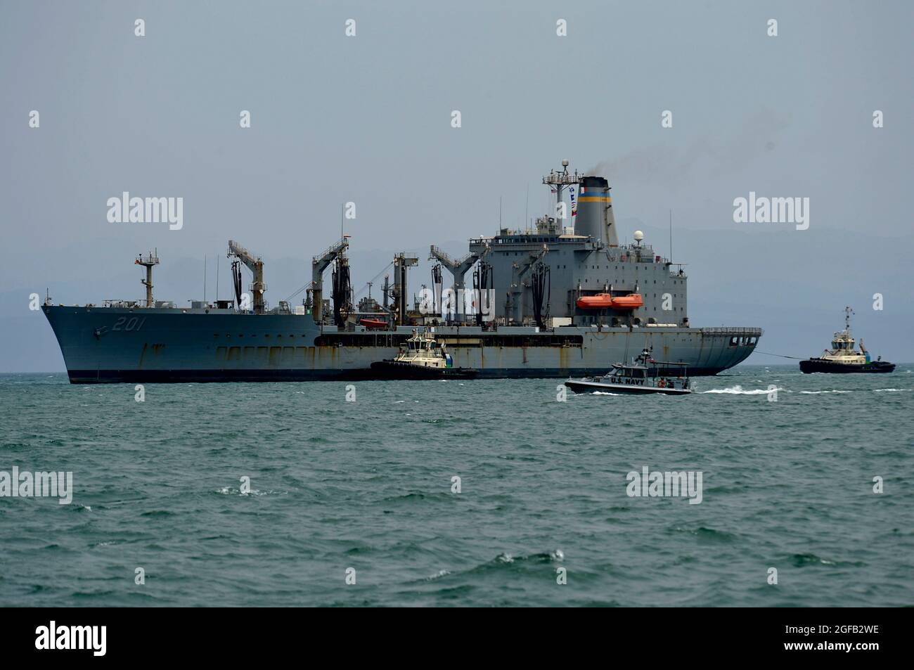 PORT OF DJIBOUTI, Djibouti (August 21, 2021) The Henry J. Kaiser-class fleet replenishment oiler USNS Patuxent (T-AO 201) arrives at the Port of Djibouti pier to receive an onload of supplies, an effort coordinated by Camp Lemonnier’s supply department, Aug. 21, 2021. Camp Lemonnier, Djibouti (CLDJ) serves as an expeditionary base for U.S. military forces providing, support to ships, aircraft, and personnel that ensure security throughout Europe, Africa and Southwest Asia. CLDJ enables maritime and combat operations in the Horn of Africa, while fostering positive U.S. – Africa relations. The b Stock Photo
