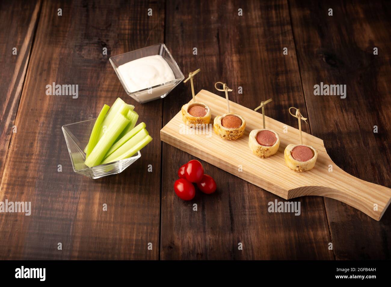 delicious snack of sliced sausages bites wrapped and in puff pastry