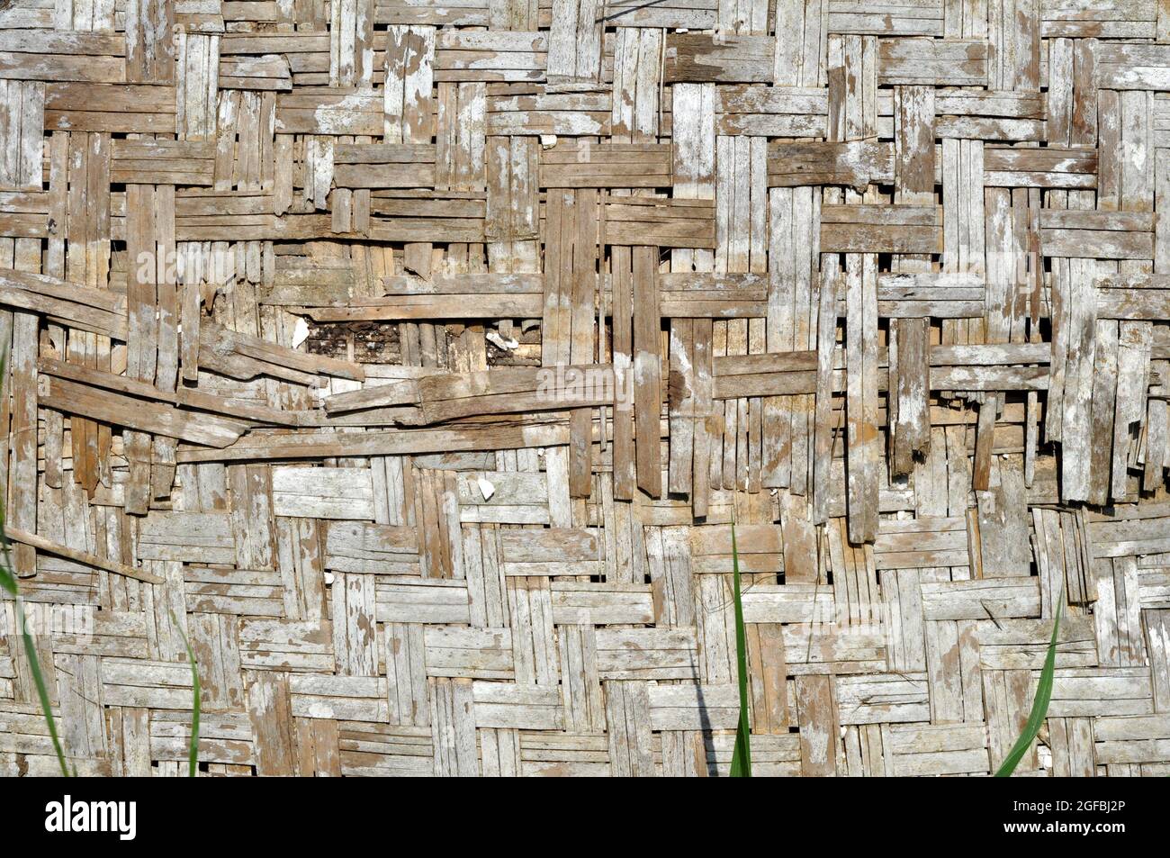 Old woven bamboo wall background texture Stock Photo