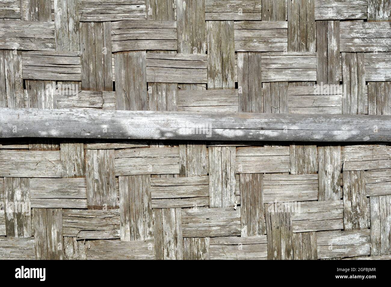 Old woven bamboo wall background texture Stock Photo