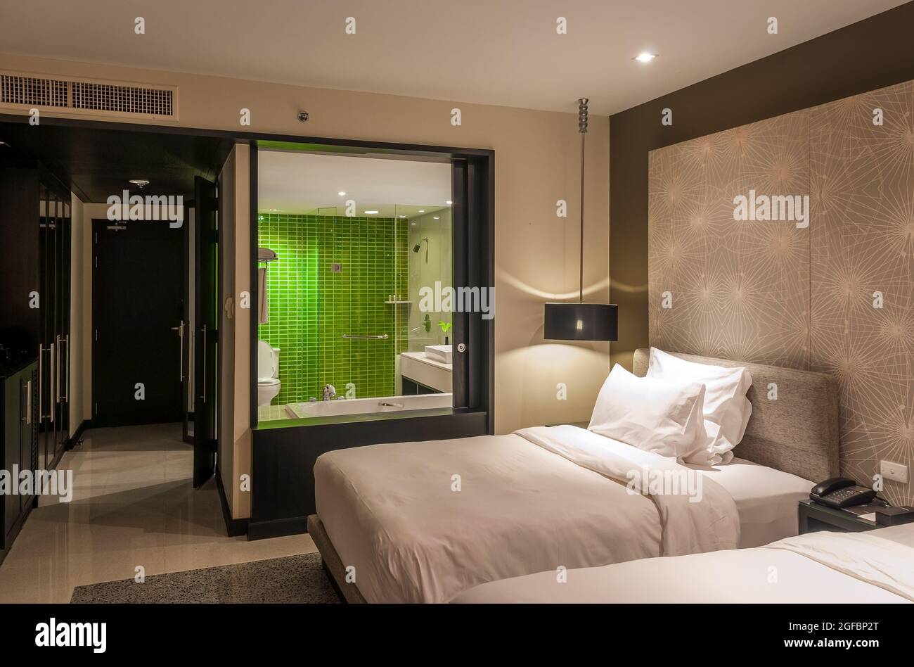 Modern luxury design bedroom with walk in shower bathroom in Chiang Rai, Thailand. Stock Photo