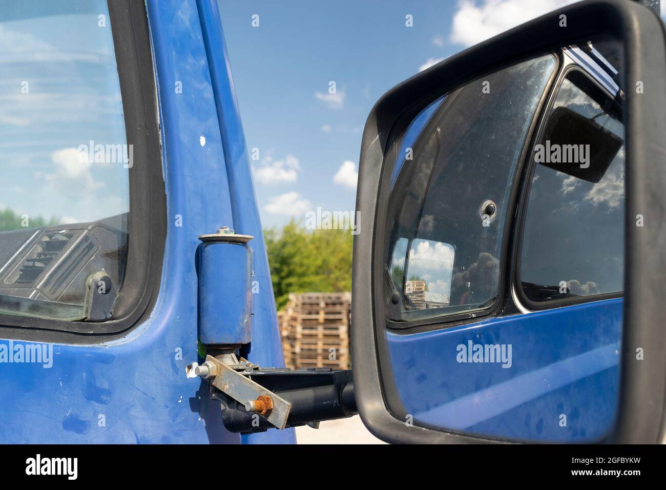 Retro side rear-view mirror on the road in the factory Stock Photo - Alamy