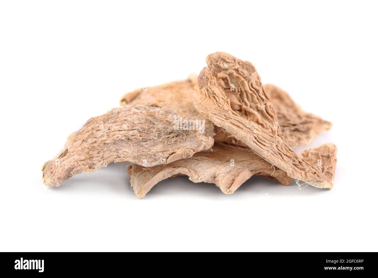 Dried ginger slices isolated on white Stock Photo Alamy