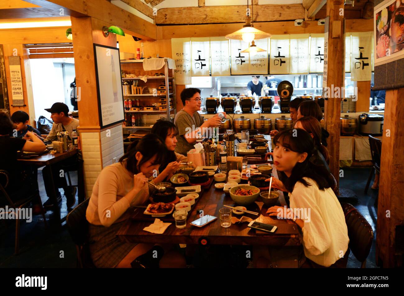 Dining at the Doma Insadong Korean beef restaurant. Seoul, South Korea