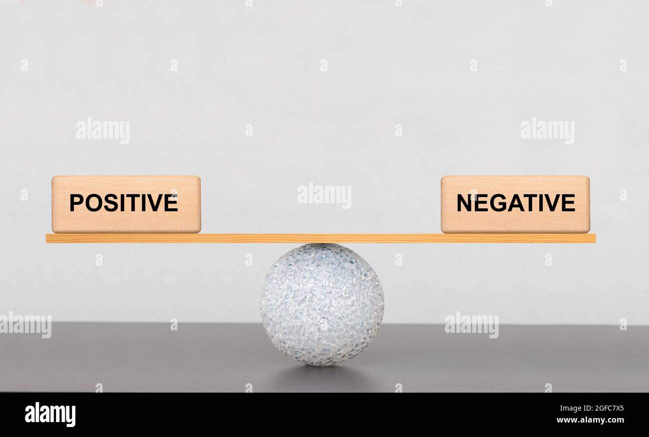 positive and negative in balance Stock Photo