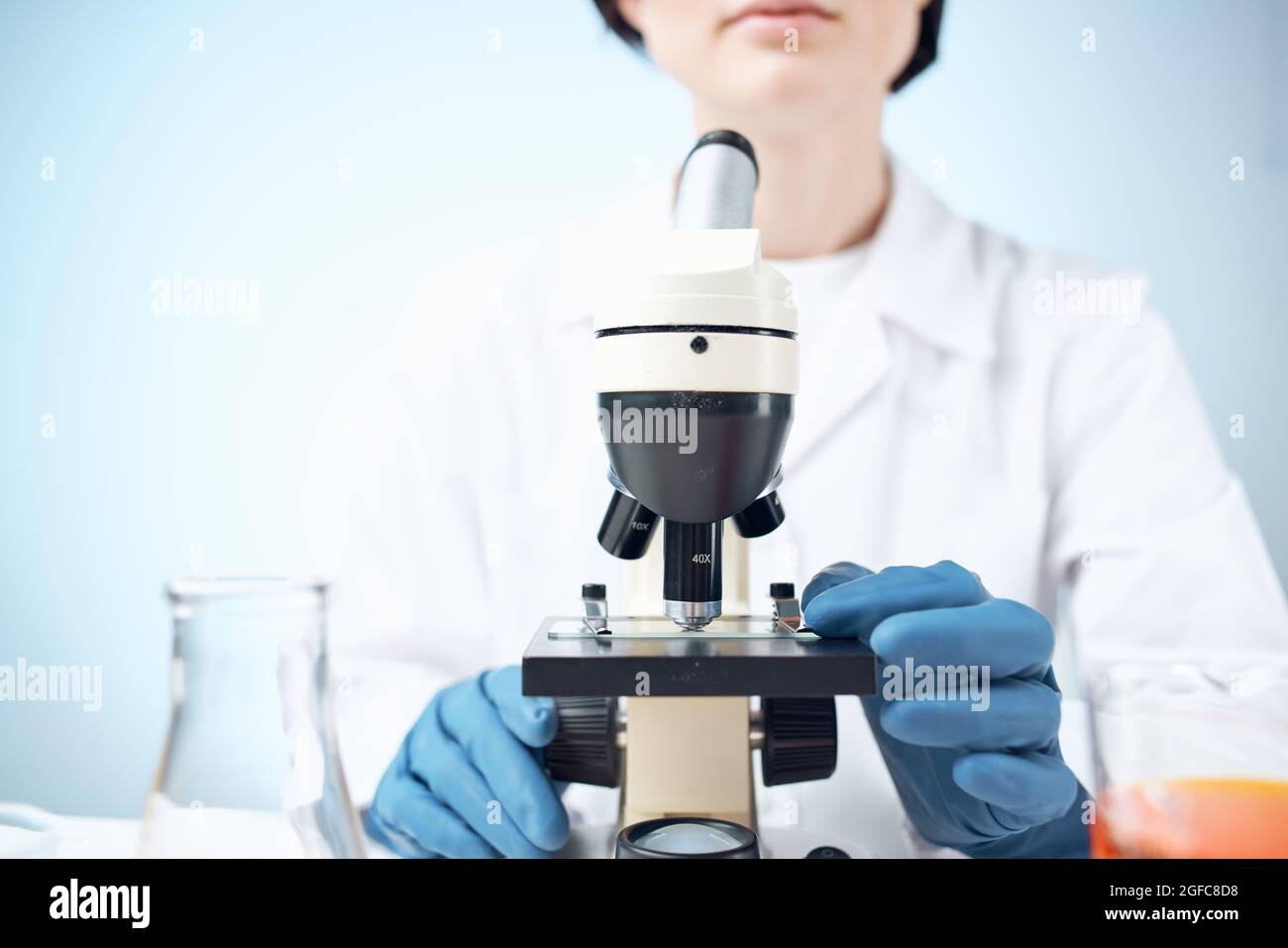 Solution Microscope laboratory research microscope chemical solution science analyzes Stock ...