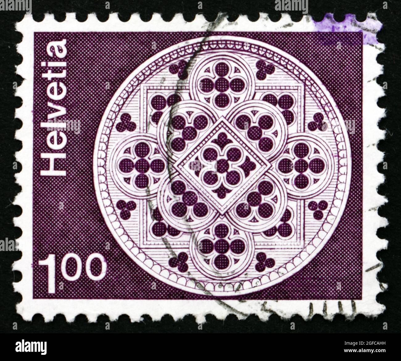 SWITZERLAND - CIRCA 1974: a stamp printed in the Switzerland shows Rose Window, Lausanne Cathedral, circa 1974 Stock Photo