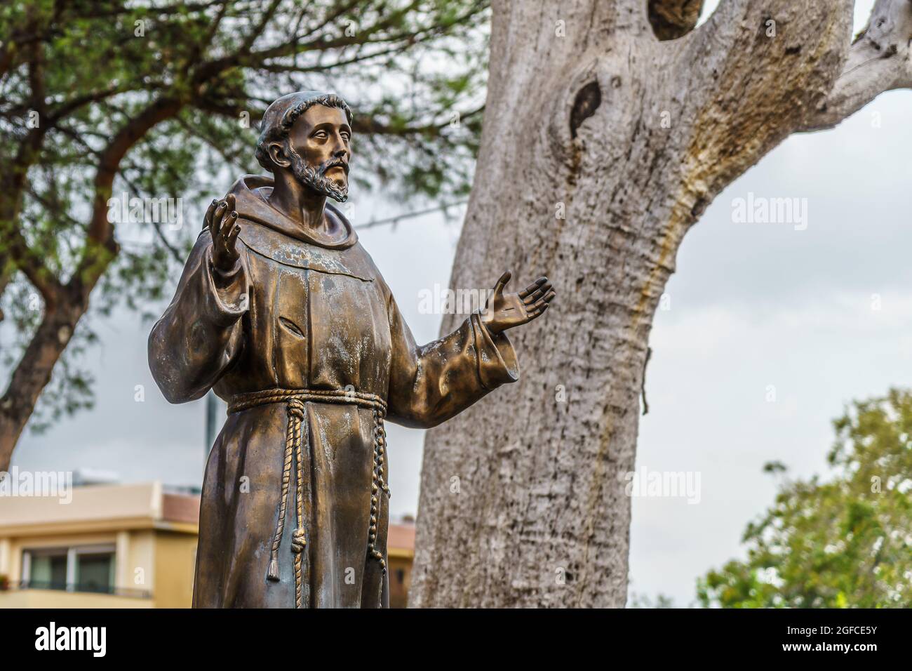 Statue of St Francis of Assisi outside of Franciscan complex of the Church of Santa Maria del Pozzo in Somma Vesuviana, Naples. Located on area occupied by an ancient medieval church. Stock Photo