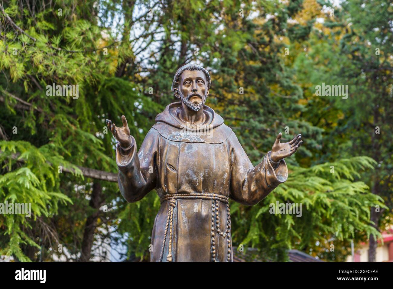 Statue of St Francis of Assisi outside of Franciscan complex of the Church of Santa Maria del Pozzo in Somma Vesuviana, Naples. Located on area occupied by an ancient medieval church. Stock Photo