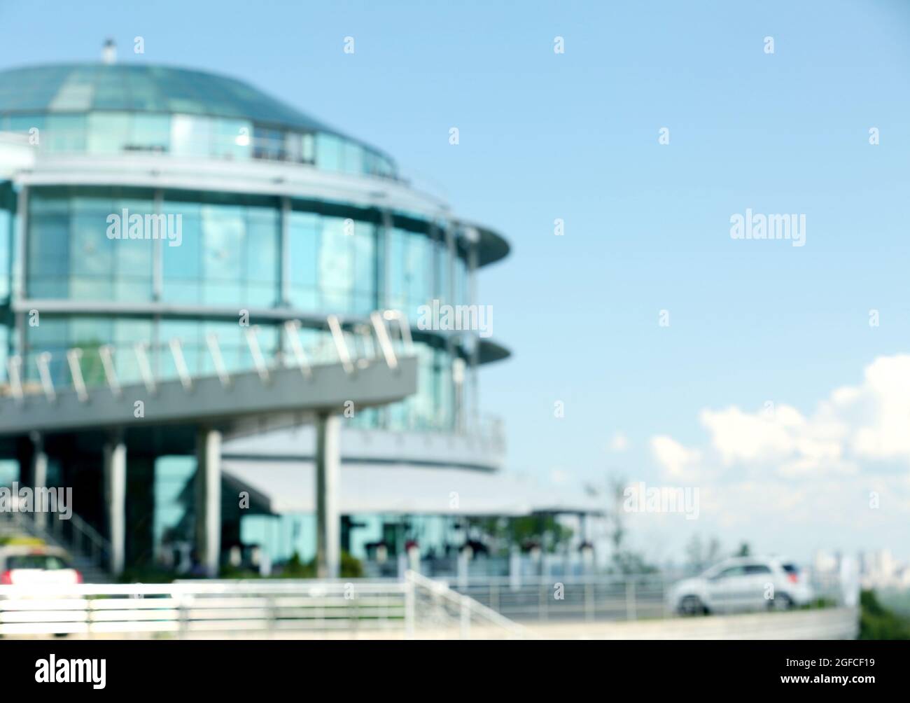 Modern office building on blue sky background Stock Photo - Alamy