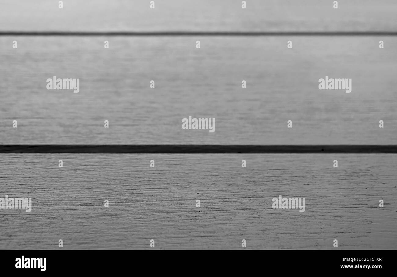 Closeup Texture of Horizontal Patterned Wooden Table Surface in Monochrome Stock Photo