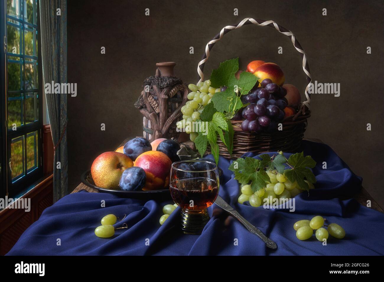 Still life with fruits and wine glass Stock Photo