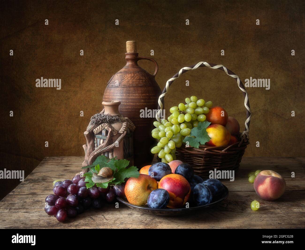 Still life with fruits on a table Stock Photo - Alamy
