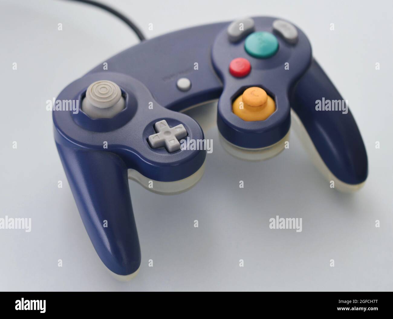 Photo of a gaming controller on white background Stock Photo - Alamy
