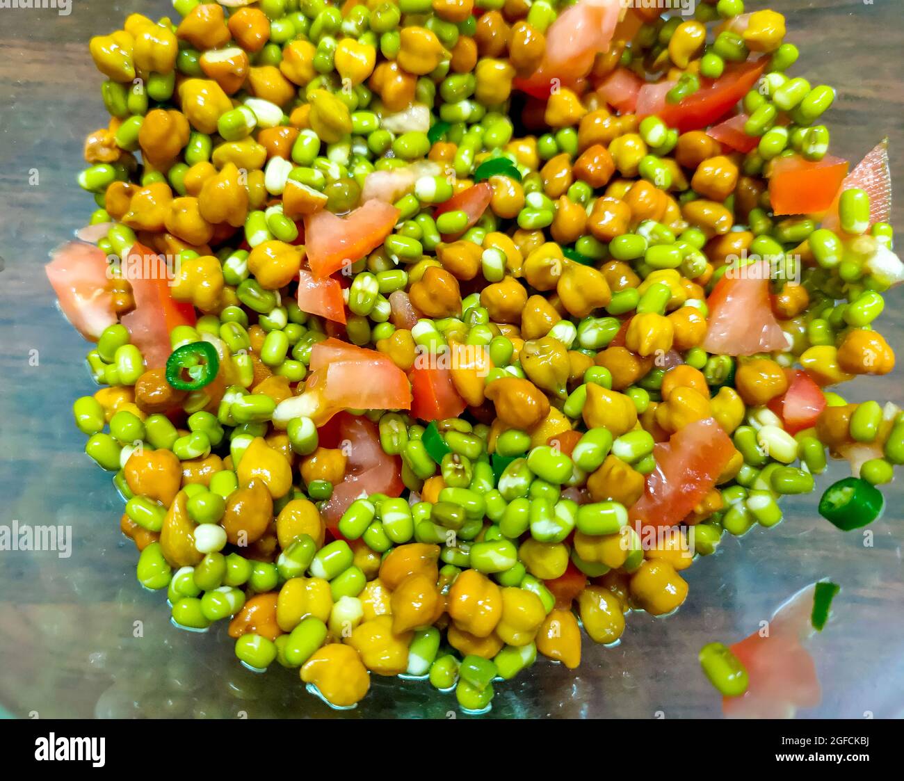 Soaked Chickpeas and Moong Salad.very useful in weight loss Stock Photo