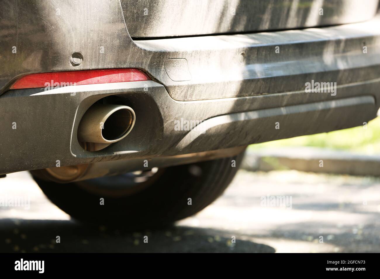 Exhaust pipe and back part of a car Stock Photo Alamy