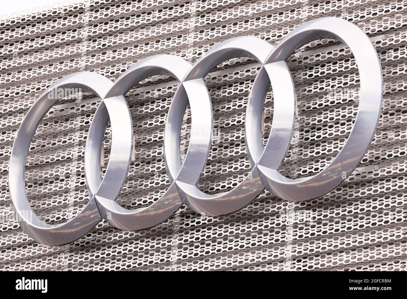 The Audi logo and signage at the main Audi car dealership in Belfast, Northern Ireland. Stock Photo