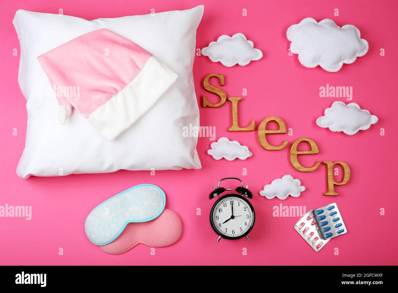Sleep concept with accessories on color background Stock Photo - Alamy