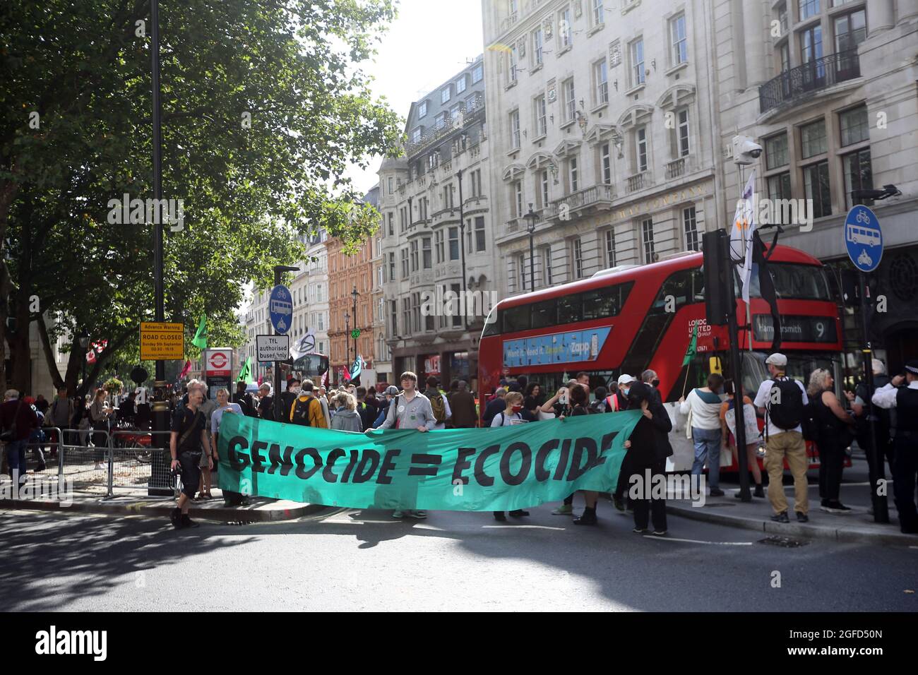 London, England, UK. 25th Aug, 2021. Climate change campaign group Extinction Rebellion activists stage a protest outside the Embassy of Brazil in London demanding protection of Amazon forests and indigenous lands in the third day of two weeks of planned action. (Credit Image: © Tayfun Salci/ZUMA Press Wire) Stock Photo