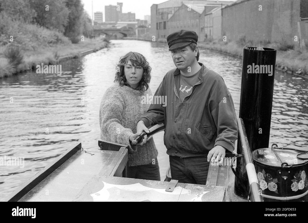 'Cap'n' Michael: actor Michael Elphick as BOON the leading character for the Central TV series BOON in 1985 takes time of from filming to enjoy the life on narrow boat canal craft as he learns to navigate the craft through the Birmingham canal system. Stock Photo