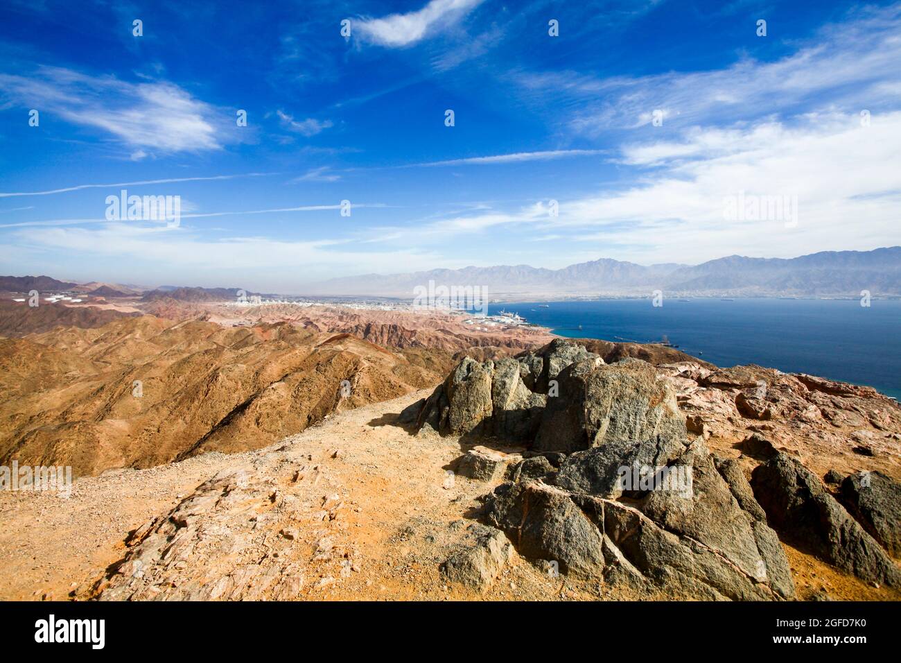 The colourful Eilat mountain range The gulf of Aqaba in the background Stock Photo