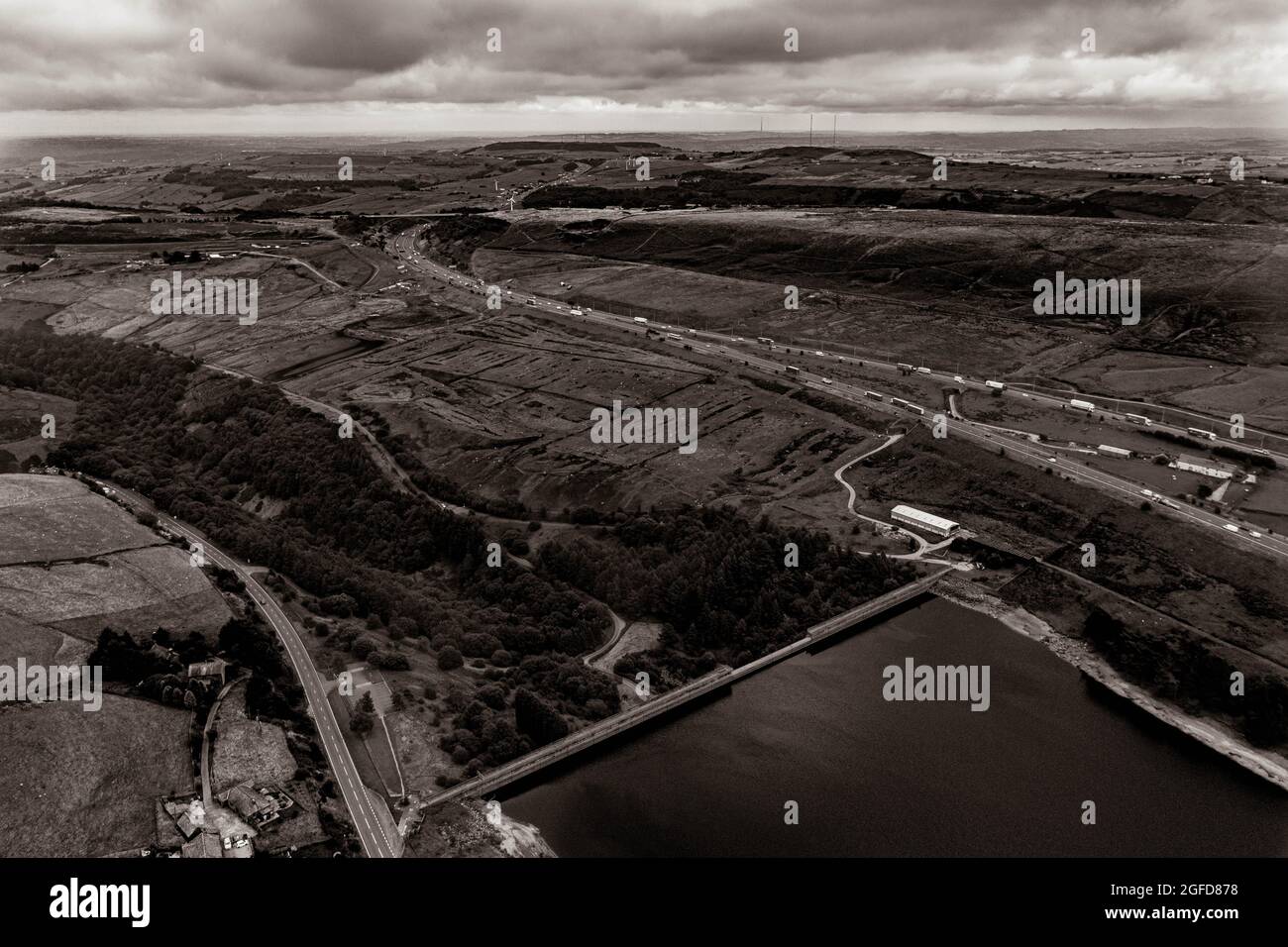 Rishworth Moor Motorway Ainley Top M62 Stott Hall Farm Aerial Birds Eye View The House in the Middle of the road  the M62 motorway was built around Stock Photo